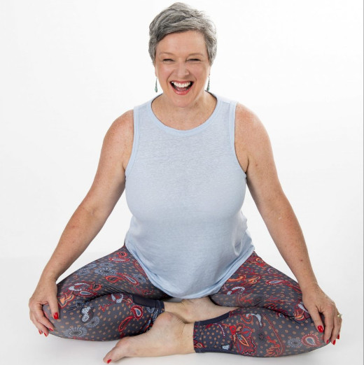 Image of smiling LLisa West - Yoga Therapist